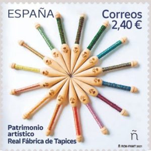 56. Sello Real Fábrica de Tapices